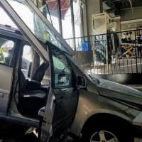 <p>The SUV crashed through the front of the Charming Charlie store at City Place.</p>