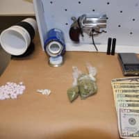 <p>Items found in the car and seized included a loaded handgun, 46 Methylone pills, plastic bags containing 12 grams of marijuana, cash believed to be the proceeds of narcotics sales, five glassine baggies of crack cocaine and a scale, police said.</p>