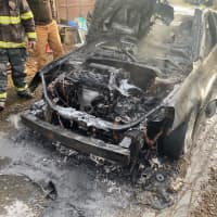 <p>A car that went up in flames just a few feet away from a Sussex County home Wednesday afternoon is under investigation, authorities said.</p>