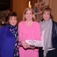 <p>ArtsWestchester Board Member Barbara Elliot, left, and Sherry Wiener, right, present the Education Award to Rye Arts Center, which was accepted by Rye Arts Center Executive Director Meg Rodriguez.</p>