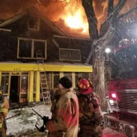 <p>A home built in 1900 was heavily damaged during a three-alarm fire.</p>
