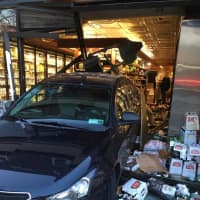 <p>An elderly driver backed into the front of a market in Pelham.</p>