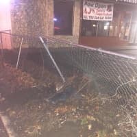 <p>The driver of a Porche Cayenne attempted to flee police before driving through a fence at the Airmont Diner and flattening his tires.</p>