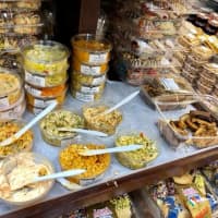 <p>Sample spreads and crackers at Maywood&#x27;s Marketplace.</p>