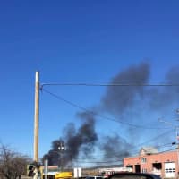 <p>Smoke from several tractor-trailers on fire in Orangeburg.</p>