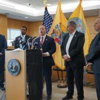 <p>Maron, at right, with various officials at a news conference in Teaneck last Sunday.</p>