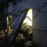 <p>A newspaper deliveryman in Ramapo drove his car through the front of a local home on accident.</p>