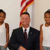 <p>Superintendent Joseph Ricca poses with some of his students on the first day of school.</p>