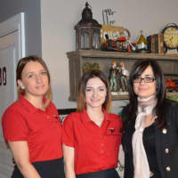 <p>Waitresses Lily Sekularac and Kateryna Korolchuck stand with Snezana Milic, owner of Cafe Bubamara in Clifton.</p>