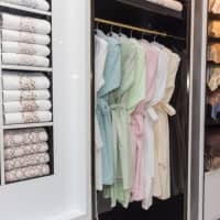 <p>Luxurious robes and towels are part of a large inventory at Togas in Greenwich.</p>