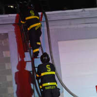 <p>Methuen firefighters on scene of a 2-alarm fire at 52 Hampshire Street</p>