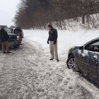 <p>Gov. Andrew Cuomo helps a stranded driver on a stretch of the Sprain Brook Parkway near Hawthorne during the mid-February snowstorm.</p>