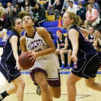 <p>Bethel&#x27;s Amanda Towey splits defenders and drives to the basket during Wednesday&#x27;s championship game against New Fairfield.</p>