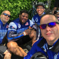 <p>Delossantos, center, participated in this year&#x27;s Police Unity Tour.</p>