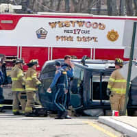 <p>Firefighters extricated the driver following the rollover in front of the hospital on Old Hook Road in Westwood.</p>