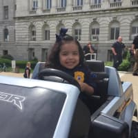 <p>Fairview Chief Isabel, 4, takes the mini Sheriff&#x27;s Department vehicle for a spin.</p>