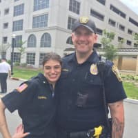 <p>Leonia Chief Sophia, 21, with one of the department&#x27;s officers.</p>