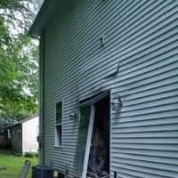 <p>All the windows and doors were blown out of a home during a gas explosion.</p>
