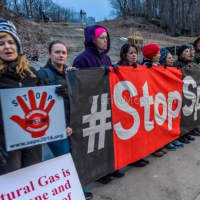 <p>Activists at a Peekskill demonstration last month target the Algonquin gas pipeline project, which will run close to the Indian Point nuclear power facility in Buchanan.</p>