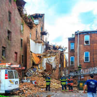 <p>A shot of the devastation caused by the building collapse.</p>