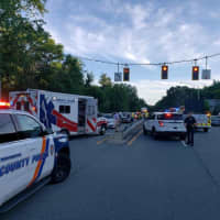 <p>A car went airborne after striking a guardrail on the Saw Mill River Parkway in Dobbs Ferry, landing on two other vehicles.</p>