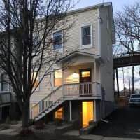 <p>This home located at 36 Gifford Ave. was in sorry shape when the city sold it to restaurateur Michael Lund. It has since been renovated into a two-family home. The city hopes the project will spark similar turnarounds in the neighborhood.</p>