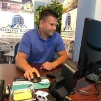 <p>Retired Hackensack police officer Alex Ferenczi opened Blueline Realty Group on Hudson Street in 2017. Nearly a dozen of his 30 associates work in law enforcement.</p>