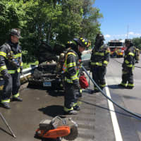 <p>Fairfield firefighters quickly douse the flames of a car fire.</p>