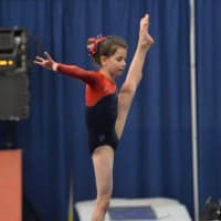 <p>Level 3 gymnast Abby O’Brien won the 10A All Around title with 38.30, the highest score for the Darien team at the YMCA Northeast Regional Gymnastics Championships.</p>