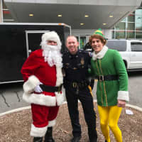 <p>&quot;Santa&quot; and Bergen County Sheriff&#x27;s Officer Walter Hutchinson join &quot;Elf&quot; at the Sanzari Children&#x27;s Hospital in Hackensack.</p>