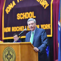 <p>Visa CEO and 2018 Alumni Award Recipient Alfred F. Kelly Jr., ’76, speaks to the Class of 2018 about choices and consequences during commencement exercises at Iona College on May 24.</p>
