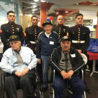 <p>Posing with Marines from MAG49, originating out of Stewart Air Base in Orange County are -- front from left to right -- World War II Marines veterans Tom Perrottof New Rochelle, Sol Brizer of Yonkers and Peter Perri of Armonk. They will be on flight.</p>