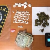 <p>The drugs and cash seized during the stop.</p>
