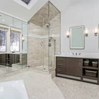 <p>New granite countertops are featured in the master bathroom.</p>