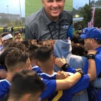 <p>The LHS varsity soccer team gathers on the field the night of beloved coach Fausto&#x27;s passing. Many players remembered him as being a dedicated coach and father figure.</p>