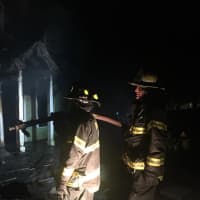 <p>Fire crews were called to the fire in the early morning and were still extinguishing hotspots at the structure well into the night.</p>