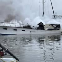 <p>One burning boat sinks, second destroyed in Maryland marina.</p>