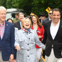 <p>They love a parade: Gov. Andrew Cuomo marches alongside Bill and Hillary Clinton in the New Castle Memorial Day Parade.</p>