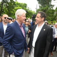 <p>Former President Bill Clinton of Chappaqua and Gov. Andrew Cuomo during the New Castle Memorial Day Parade.</p>