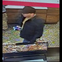 <p>A man suspected of installing skimming devices on ATMs at a Wawa convenience store in Galloway Township, NJ.</p>
