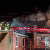 <p>Fire crews on the roof.&nbsp;</p>