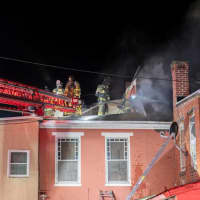 <p>Crews on the roof, appear to be knocking out hotspots.&nbsp;</p>