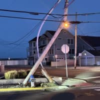 <p>An SUV severely bent two utility poles in a crash in Point Pleasant Beach, NJ, on Saturday, Apr. 20, 2024.</p>