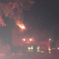 <p>Firefighters battle a blaze at a Cortlandt home.</p>