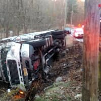 <p>A milk truck rolled over while attempting to avoid a school bus.</p>