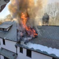 <p>A large home received heavy damage to the roof and attic areas.</p>