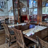 <p>Old City Public House is a cozy, family-friendly restaurant on Long Island which makes a specialty sandwich.</p>
