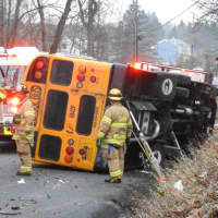 <p>The driver of a school bus was injured when the vehicle rolled on its side.</p>