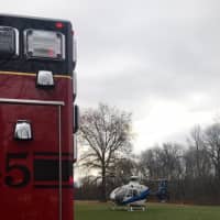 <p>The driver of a school bus was airlifted to the hospital after being pulled from the vehicle.</p>