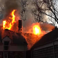 <p>Norwalk firefighters battled a fire in a 6,500-square-foot home.</p>